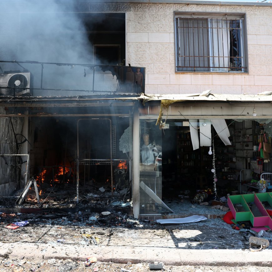 Blood in the Streets and Death in the Air: Residents Survey Damage in Syrian City